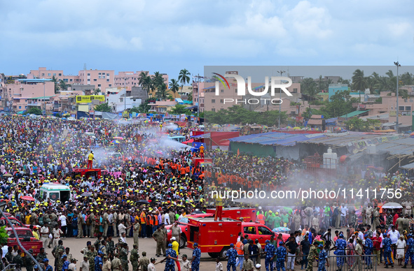  Fire Fighters Are Seen As They Spray Water Onto The Devotees For Relax As They Are Participating On The End Day Of The Ditties Nine Days Lo...