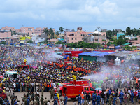  Fire Fighters Are Seen As They Spray Water Onto The Devotees For Relax As They Are Participating On The End Day Of The Ditties Nine Days Lo...