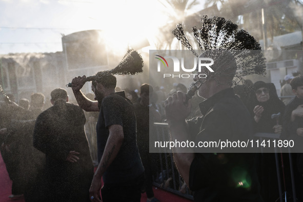 Muslims Pay Their Respects In Karbala, Iraq, on july 15, 2024. Ashura Is A Period Of Mourning In Remembrance Of The Seventh - Century Martyr...