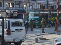 Indian troopers are clicking pictures during a procession on the 8th of Muharram in Srinagar, Indian Administered Kashmir, on July 15, 2024....