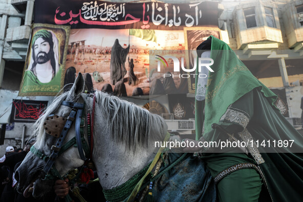 Muslims Pay Their Respects In Karbala, Iraq, on july 15, 2024. Ashura Is A Period Of Mourning In Remembrance Of The Seventh - Century Martyr...