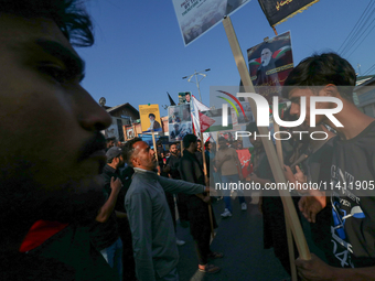 Kashmiri Shia Muslims are mourning during a procession on the 8th of Muharram in Srinagar, Indian Administered Kashmir, on July 15, 2024. (