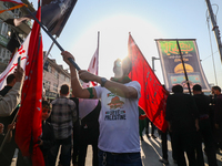 Kashmiri Shia Muslims are displaying flags during a procession on the 8th of Muharram in Srinagar, Indian Administered Kashmir, on July 15,...