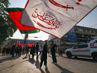 Kashmiri Shia Muslims are displaying flags during a procession on the 8th of Muharram in Srinagar, Indian Administered Kashmir, on July 15,...