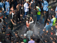 A Kashmiri Shia Muslim is flagellating himself during a procession on the 8th of Muharram in Srinagar, Indian Administered Kashmir, on July...