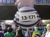 Movements against the PT are holding a protest today on Avenida Paulista, in the central region of Sao Paulo. During the event, a doll of fo...