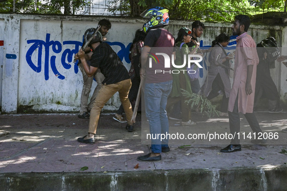 Anti-quota protesters and students backing the ruling Awami League party are clashing on Dhaka University campus in Dhaka, Bangladesh, on Ju...