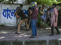 Anti-quota protesters and students backing the ruling Awami League party are clashing on Dhaka University campus in Dhaka, Bangladesh, on Ju...