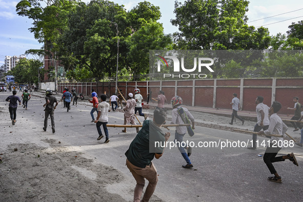 Anti-quota protesters and students backing the ruling Awami League party are clashing on Dhaka University campus in Dhaka, Bangladesh, on Ju...