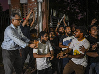 Anti-quota protesters and students are shouting in front of Shahidullah Hall, during clashes between anti-quota protesters and students back...