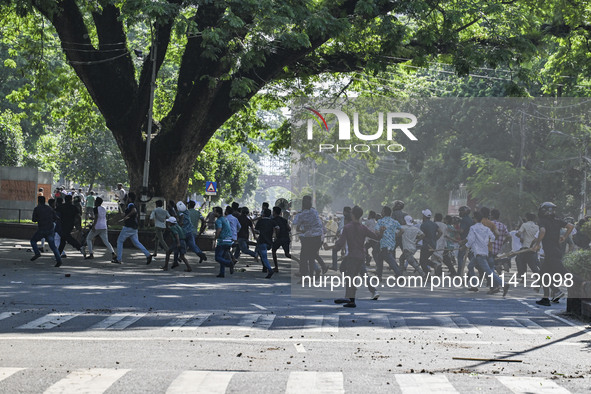 Anti-quota protesters and students backing the ruling Awami League party are clashing on Dhaka University campus in Dhaka, Bangladesh, on Ju...