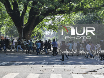 Anti-quota protesters and students backing the ruling Awami League party are clashing on Dhaka University campus in Dhaka, Bangladesh, on Ju...