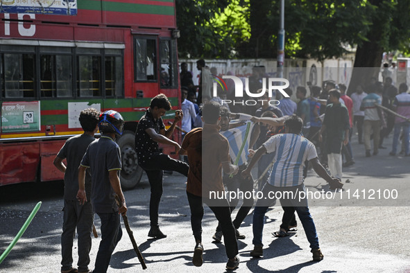 Anti-quota protesters and students backing the ruling Awami League party are clashing on Dhaka University campus in Dhaka, Bangladesh, on Ju...