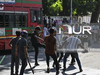 Anti-quota protesters and students backing the ruling Awami League party are clashing on Dhaka University campus in Dhaka, Bangladesh, on Ju...