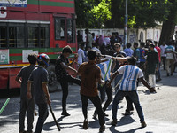 Anti-quota protesters and students backing the ruling Awami League party are clashing on Dhaka University campus in Dhaka, Bangladesh, on Ju...