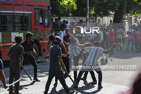 Anti-quota protesters and students backing the ruling Awami League party are clashing on Dhaka University campus in Dhaka, Bangladesh, on Ju...