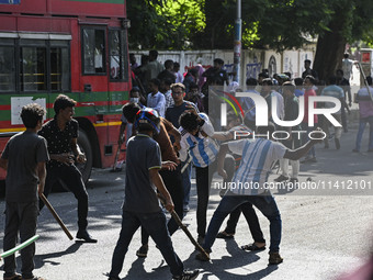 Anti-quota protesters and students backing the ruling Awami League party are clashing on Dhaka University campus in Dhaka, Bangladesh, on Ju...