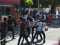 Anti-quota protesters and students backing the ruling Awami League party are clashing on Dhaka University campus in Dhaka, Bangladesh, on Ju...