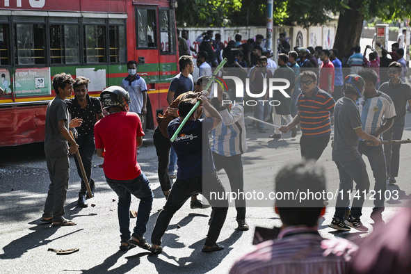 Anti-quota protesters and students backing the ruling Awami League party are clashing on Dhaka University campus in Dhaka, Bangladesh, on Ju...