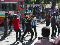 Anti-quota protesters and students backing the ruling Awami League party are clashing on Dhaka University campus in Dhaka, Bangladesh, on Ju...