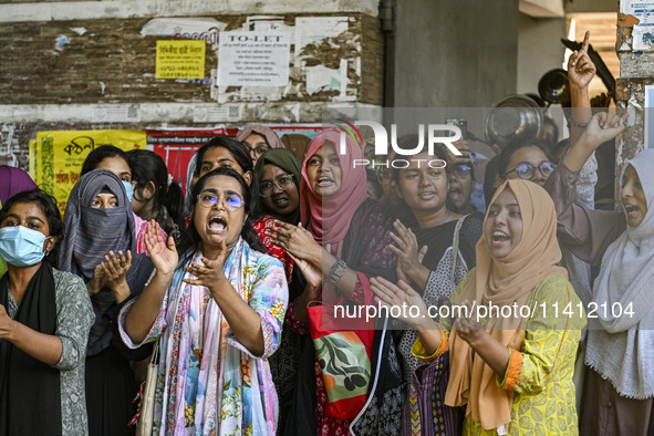 Students are shouting in front of Begum Rokeya Hall during anti-quota protests and clashes between students backing the ruling Awami League...