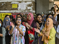 Students are shouting in front of Begum Rokeya Hall during anti-quota protests and clashes between students backing the ruling Awami League...