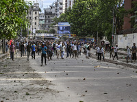 Anti-quota protesters and students backing the ruling Awami League party are clashing on Dhaka University campus in Dhaka, Bangladesh, on Ju...