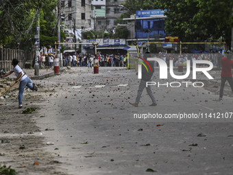 Anti-quota protesters and students backing the ruling Awami League party are clashing on Dhaka University campus in Dhaka, Bangladesh, on Ju...