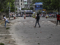 Anti-quota protesters and students backing the ruling Awami League party are clashing on Dhaka University campus in Dhaka, Bangladesh, on Ju...