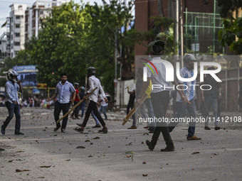 Anti-quota protesters and students backing the ruling Awami League party are clashing on Dhaka University campus in Dhaka, Bangladesh, on Ju...