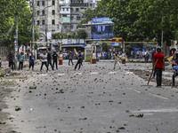 Anti-quota protesters and students backing the ruling Awami League party are clashing on Dhaka University campus in Dhaka, Bangladesh, on Ju...