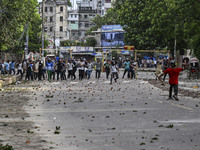 Anti-quota protesters and students backing the ruling Awami League party are clashing on Dhaka University campus in Dhaka, Bangladesh, on Ju...