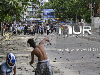 Anti-quota protesters and students backing the ruling Awami League party are clashing on Dhaka University campus in Dhaka, Bangladesh, on Ju...