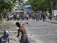 Anti-quota protesters and students backing the ruling Awami League party are clashing on Dhaka University campus in Dhaka, Bangladesh, on Ju...