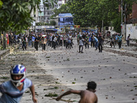 Anti-quota protesters and students backing the ruling Awami League party are clashing on Dhaka University campus in Dhaka, Bangladesh, on Ju...