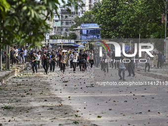 Anti-quota protesters and students backing the ruling Awami League party are clashing on Dhaka University campus in Dhaka, Bangladesh, on Ju...