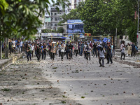 Anti-quota protesters and students backing the ruling Awami League party are clashing on Dhaka University campus in Dhaka, Bangladesh, on Ju...