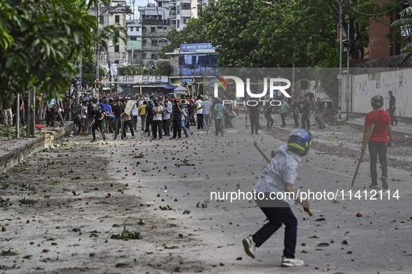 Anti-quota protesters and students backing the ruling Awami League party are clashing on Dhaka University campus in Dhaka, Bangladesh, on Ju...