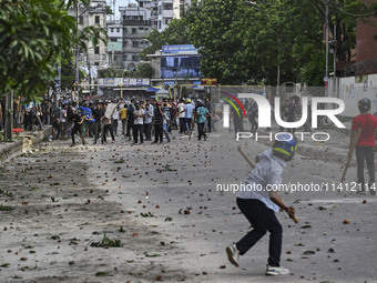 Anti-quota protesters and students backing the ruling Awami League party are clashing on Dhaka University campus in Dhaka, Bangladesh, on Ju...