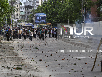 Anti-quota protesters and students backing the ruling Awami League party are clashing on Dhaka University campus in Dhaka, Bangladesh, on Ju...