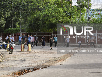 Anti-quota protesters and students backing the ruling Awami League party are clashing on Dhaka University campus in Dhaka, Bangladesh, on Ju...