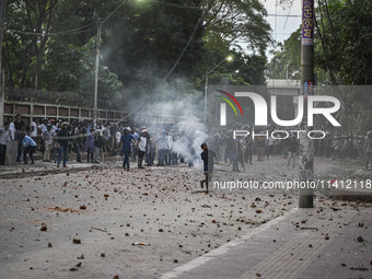 Anti-quota protesters and students backing the ruling Awami League party are clashing on Dhaka University campus in Dhaka, Bangladesh, on Ju...