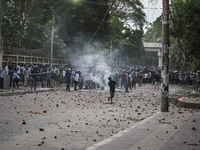 Anti-quota protesters and students backing the ruling Awami League party are clashing on Dhaka University campus in Dhaka, Bangladesh, on Ju...