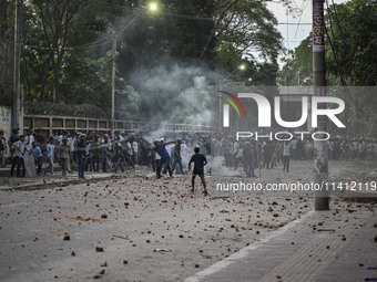 Anti-quota protesters and students backing the ruling Awami League party are clashing on Dhaka University campus in Dhaka, Bangladesh, on Ju...