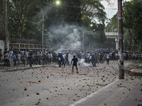 Anti-quota protesters and students backing the ruling Awami League party are clashing on Dhaka University campus in Dhaka, Bangladesh, on Ju...