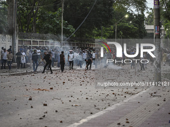 Anti-quota protesters and students backing the ruling Awami League party are clashing on Dhaka University campus in Dhaka, Bangladesh, on Ju...