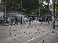 Anti-quota protesters and students backing the ruling Awami League party are clashing on Dhaka University campus in Dhaka, Bangladesh, on Ju...