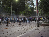 Anti-quota protesters and students backing the ruling Awami League party are clashing on Dhaka University campus in Dhaka, Bangladesh, on Ju...