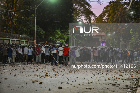 Anti-quota protesters and students backing the ruling Awami League party are clashing on Dhaka University campus in Dhaka, Bangladesh, on Ju...