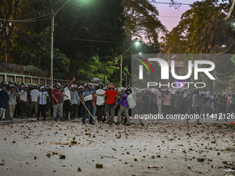 Anti-quota protesters and students backing the ruling Awami League party are clashing on Dhaka University campus in Dhaka, Bangladesh, on Ju...